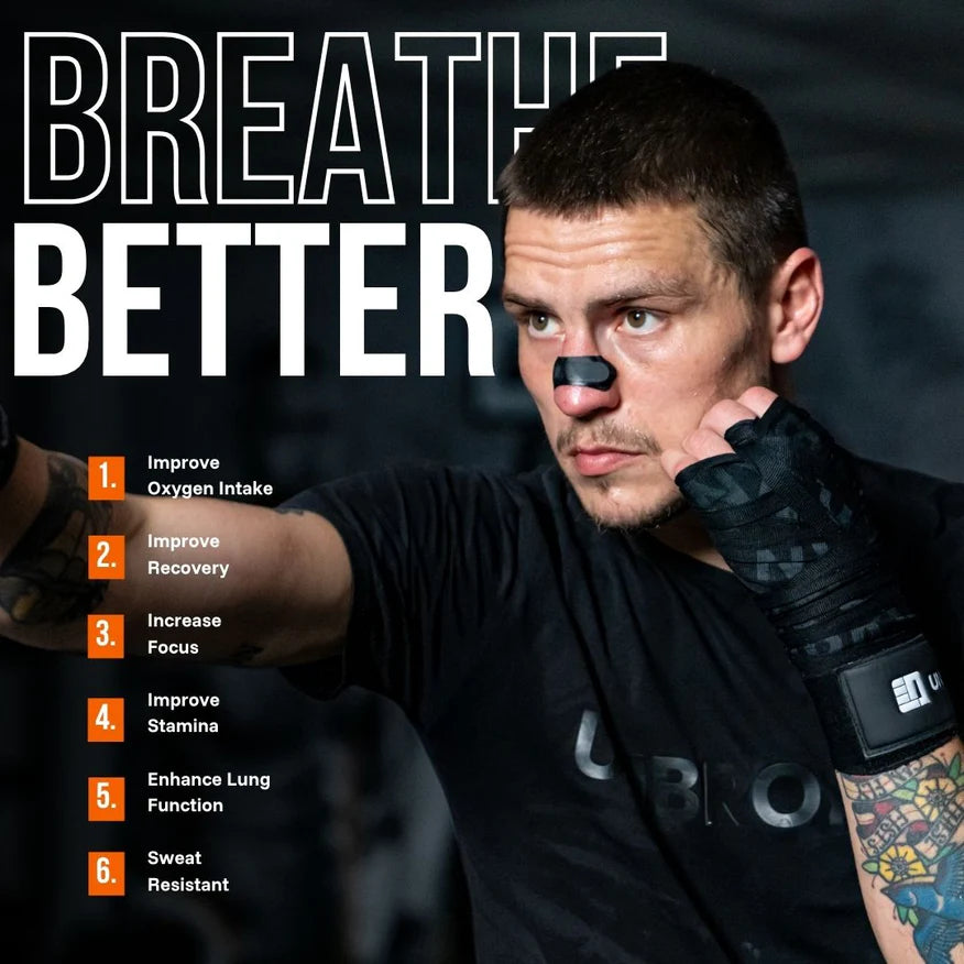 Breatheeze Performance nasal strips packaging displayed on a dark matte gym surface beside a towel and water bottle, representing strength and endurance.
